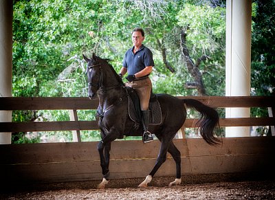 Bill Askins riding his Akhal-Teke stallion with Christian Bachinger (SRS)